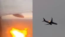 美国航空公司一客机起飞后撞鸟 发动机不断喷出火焰,飞机紧急返航